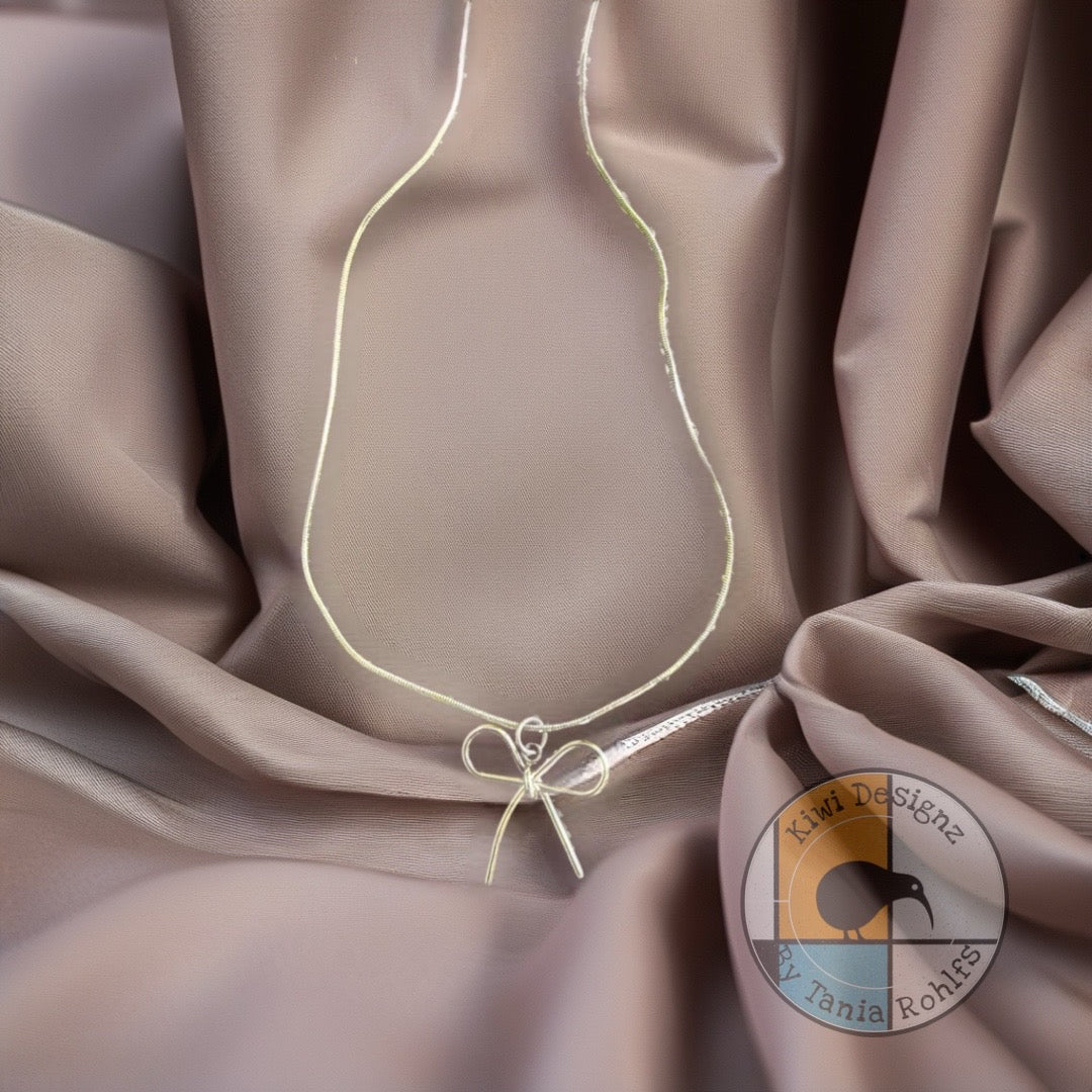Long Bow pendant necklace