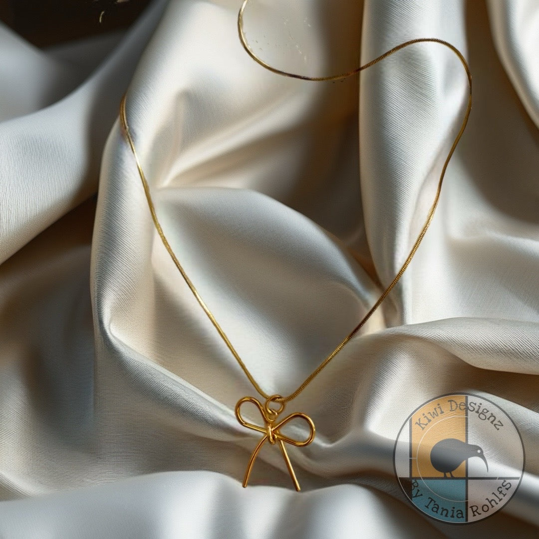 Long Bow pendant necklace