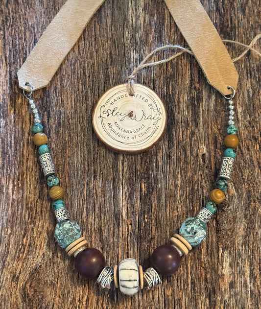 Boho beaded necklace with light brown wide flat leather strap