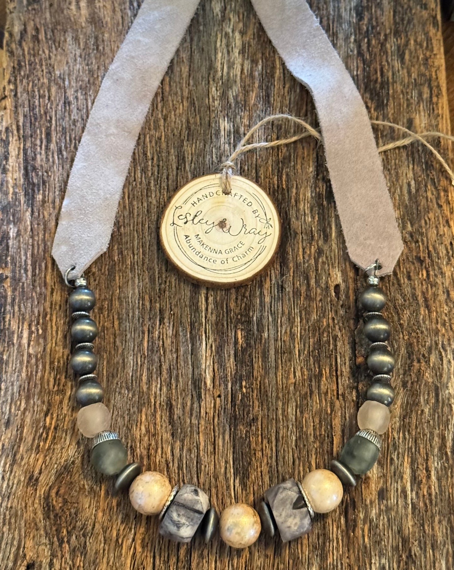 Boho beaded necklace with light gray wide flat leather strap