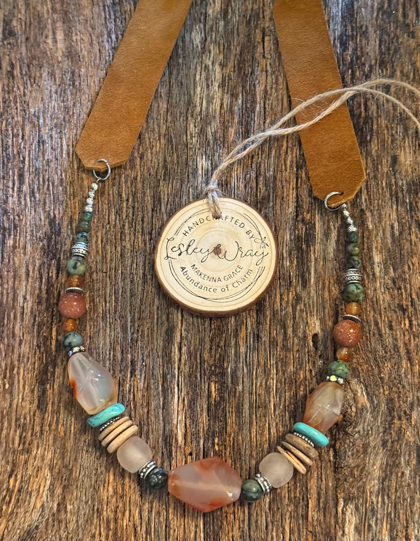 Boho beaded necklace with medium brown wide flat leather strap